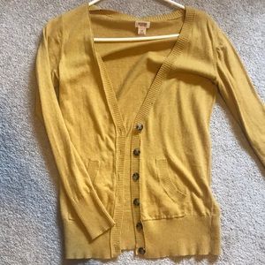 yellow button-up sweater